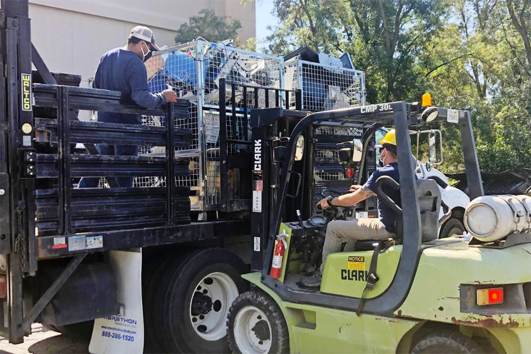 Image of construction workers for the article "Extra Space? Give It Up, Earn Incentive"
