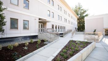 Exterior of Chemistry Building showing updated paths and low water landscapes