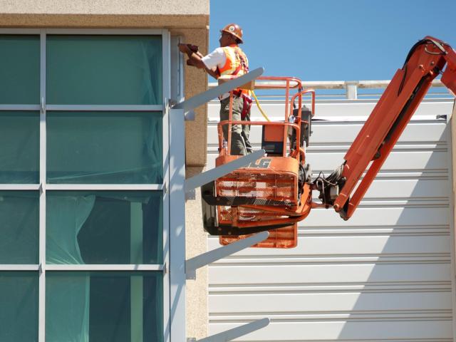 Person working on a construction lift