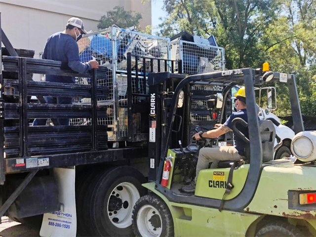 Image of construction workers for the article "Extra Space? Give It Up, Earn Incentive"