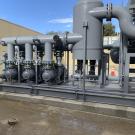 Hot water heat exchanger installed in a temporary building