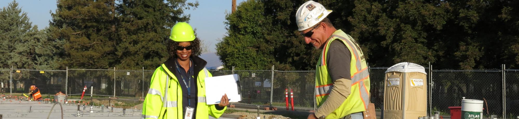 Two construction workers