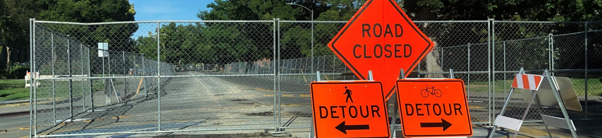 "Road Closed" and "Detour" signs
