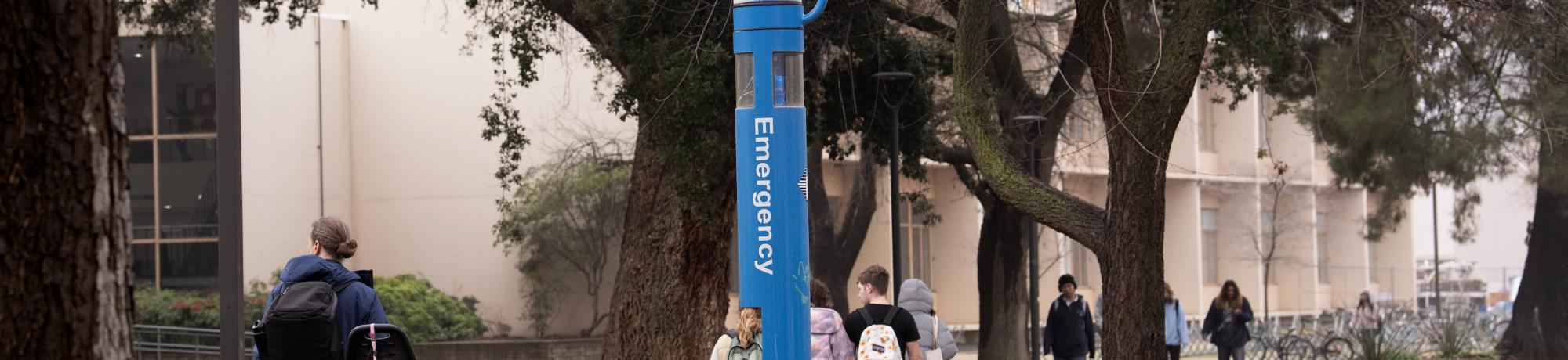 Emergency Call Box along a walking path on the UC Davis campus